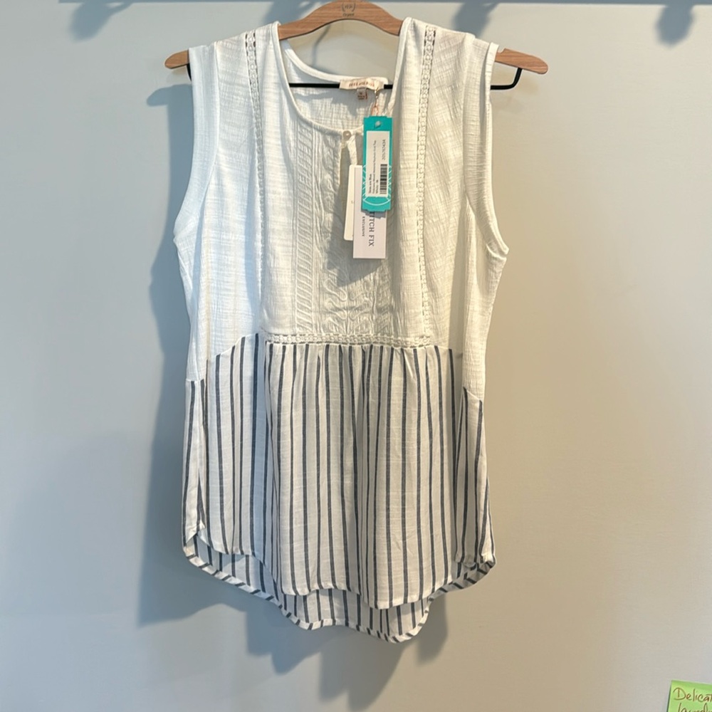 Stitch fix skies are blue sleeveless shirt.